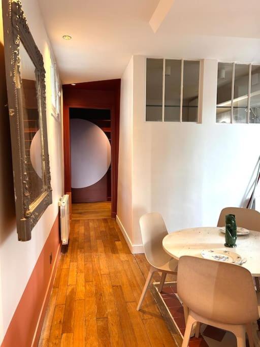 Un Fabuleux Decor Pour Un Chaleureux Appartement Париж Экстерьер фото