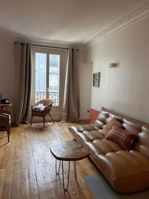 Un Fabuleux Decor Pour Un Chaleureux Appartement Париж Экстерьер фото