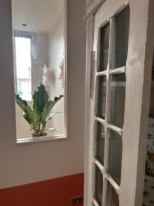 Un Fabuleux Decor Pour Un Chaleureux Appartement Париж Экстерьер фото